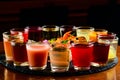 Colourful set of alcoholic cocktails in shot glasses shooters Royalty Free Stock Photo