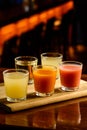 Colourful set of alcoholic cocktails in shot glasses shooters Royalty Free Stock Photo