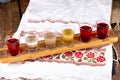 Colourful set of alcoholic cocktails in shot glasses shooters on wooden table for an alcoholic party Royalty Free Stock Photo