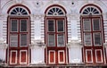 Colourful shop house with three red windows, Malacca, Malaysia