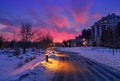 Cloudy Sunrise Over A City Promenade