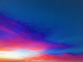 Colourful sky, sunset, deep penetrating light among blue and pink