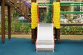 Colourful slide outdoor playground for children in residential area Royalty Free Stock Photo