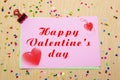 colourful sparlking stars, hearts and moons on pink paper and yellow background. Happy Valentine s day.