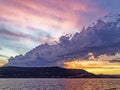 Colourful stormy pink and yellow coloured Cirrus cloudy coastal Sunset Seascape, Australia