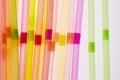 Colourful straws on a white background