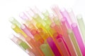 Colourful straws on a white background