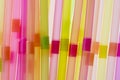 Colourful straws on a white background