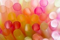 Colourful straws on a white background