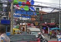 The colourful streets of Thailand`s Phuket street signage and road down to the very popular Patong Beach.