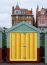 Colourful striped wooden beach hut on the sea front in Hove, Sussex, UK. Royalty Free Stock Photo