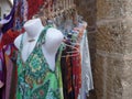 Colourful summer dresses for sale outside a clothes shop in Essaouira, Morocco