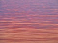 Colourful Sunrise Light on Gently Rippled Sea Water, Greece