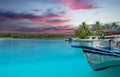 colourful sunset at the maldive island with a boat and boardwalk Royalty Free Stock Photo