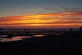 Colourful sunset over the beach at Polzeath