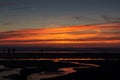 Colourful sunset over the beach at Polzeath