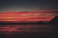 Colourful sunset over the beach at Polzeath Vintage Retro Filter