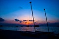 The colourful sunset of sailing boat on the Tropical Beach at Maldives Royalty Free Stock Photo