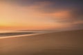 Colourful sunset at the sea, shot with intentional camera movement (ICM)