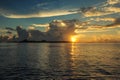 Colourful sunset in tropical islands with blue sky orange clouds and sun rays in Indian Ocean in Maldives Royalty Free Stock Photo