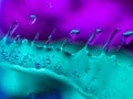 Colourful surreal psychedelic abstract liquid background. Water and oil drops with small air bubbles