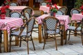 Colourful table cloths on restaurant table and chairs Royalty Free Stock Photo