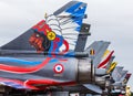 Colourful tails lined up at fighter town
