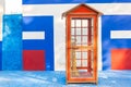 Colourful telephone booth with colorful background Royalty Free Stock Photo