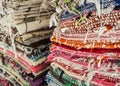 Colourful textile rugs or blankets displayed on street market in Marrakesh, Morocco - closeup detail Royalty Free Stock Photo