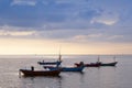 Colourful Thailand fishing boats at sunset wood fishing boats used in Asia for sustainable fishing in shallow seas