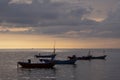 Colourful Thailand fishing boats at sunset wood fishing boats used in Asia for sustainable fishing in shallow seas