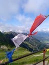 Colourful Tibetan prayful flags flutter on wind on the mountain