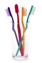 Colourful toothbrushes in a glass Royalty Free Stock Photo