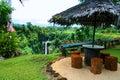 Colourful tropical paradise garden in Oceania, wooden shelter wi