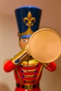 Colourful trumpet playing wooden doll Royalty Free Stock Photo