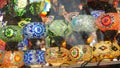 Colourful turkish lamps from glass mosaic glowing. Arabic multi colored authentic retro style lights. Many illuminated moroccan