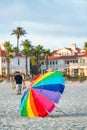 Colourful umbrella on a beautiful beach at sunset Royalty Free Stock Photo