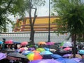 Colourful umbrella cover Thai people dress in black with grieve for the passing of the king, Bangkok , Thailand