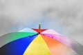 Colourful umbrella,stormy sky