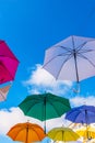 Colourful umbrellas urban street decoration. Hanging colorful um