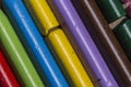 Colourful used crayons close up in a diagonal row Royalty Free Stock Photo