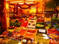 A colourful and varied display of fresh fruit and vegetables .