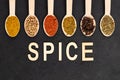 Colourful various herbs and spices on dark background Royalty Free Stock Photo