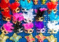 Various, colourful Venetian masks with feathers, souvenirs Royalty Free Stock Photo