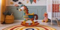 Colourful vibrant childrens rocking horse in a nursery setting Royalty Free Stock Photo