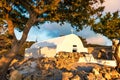 Colourful view of Greek orthodox church built on ruins of Monolithos castle during sunset Rhodes, Greece Royalty Free Stock Photo