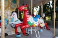Colourful vintage carousel in a summer park. Royalty Free Stock Photo