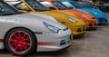 Classic cars: row of colourful Porsches, the iconic 911