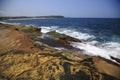 Colourful volcanic coastline