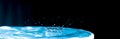 Colourful water splash - water droplet on dark background - ocean blue water droplet Royalty Free Stock Photo